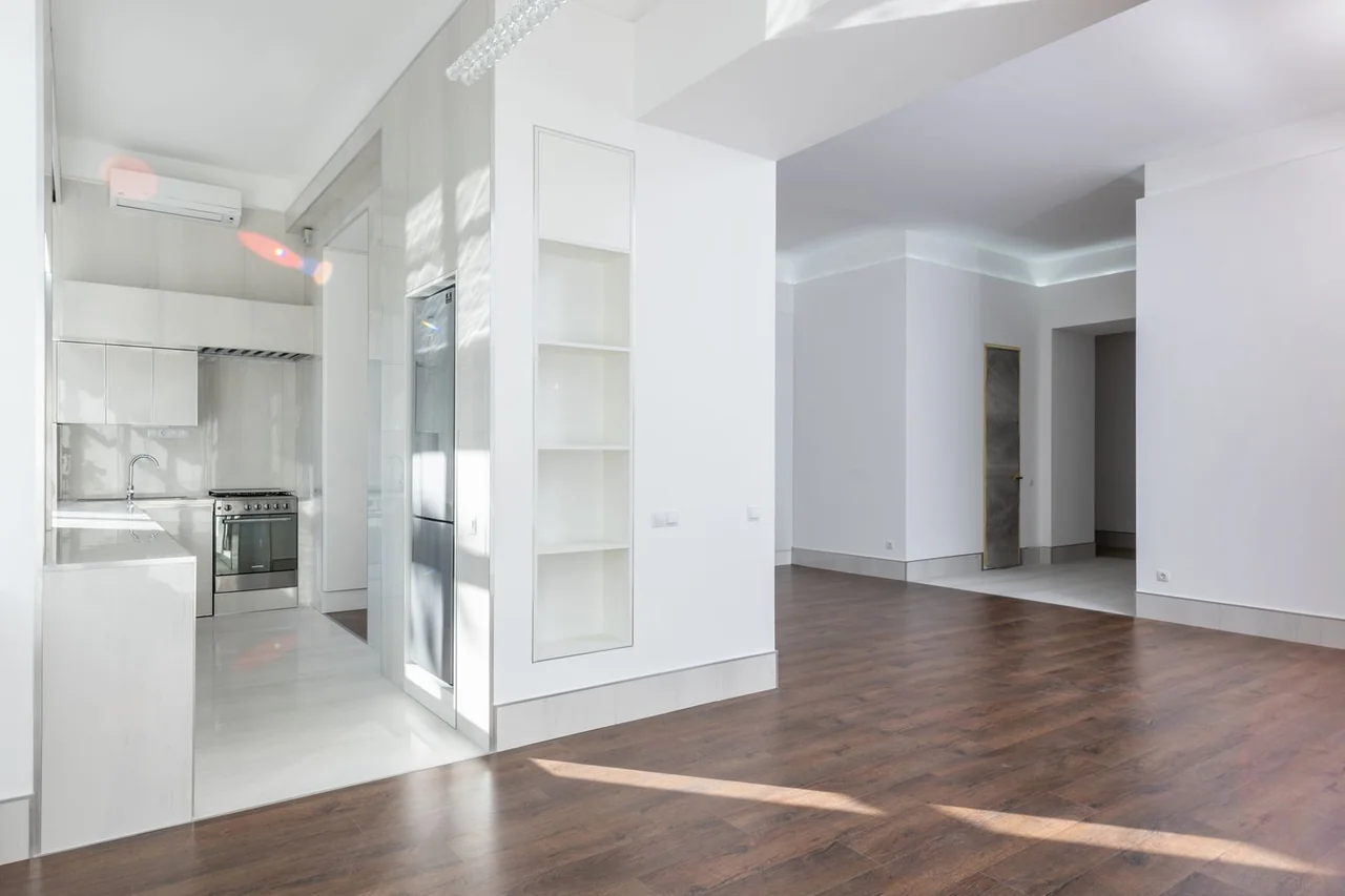 Immaculate modern living space with wooden floors
