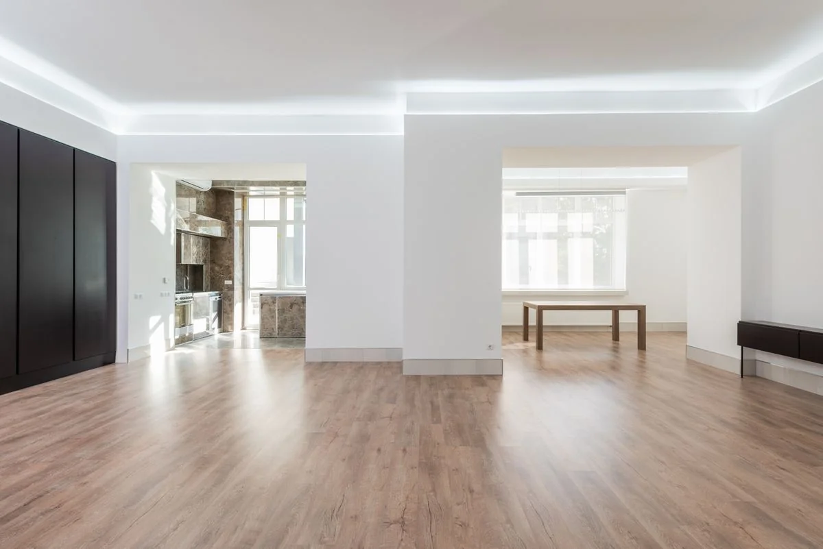 Immaculately clean and bright modern interior with wooden flooring